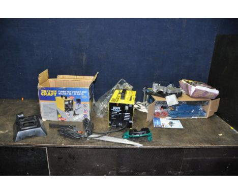 A WORKZONE WWRT/17 ROUTER TABLE in box still packaged, a Power Craft Arc Welder in box (plug cut off so untested) with screen