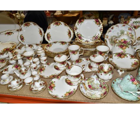 A LARGE QUANTITY OF ROYAL ALBERT 'OLD COUNTRY ROSES' PATTERN TEA AND DINNERWARE, comprising three tennis sets, two mugs, one 