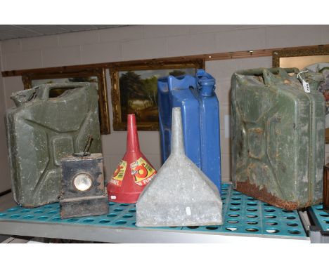 THREE 20 LITRE METAL JERRY CANS, one stamped with crows foot arrow and dated 1987, one in poor external condition with rustin