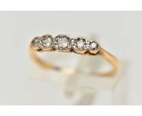 A FIVE STONE DIAMOND RING, five single cut diamonds, set in a white metal illusion setting, leading on to a yellow metal shan