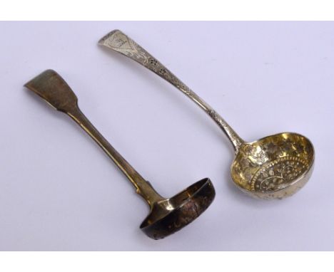 A George III hallmarked silver sifter ladle with gilt bowl centred with a cast bird within border of engraved ivy and floral 