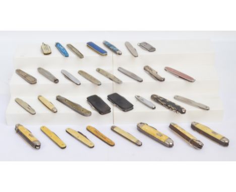 A collection of various predominantly chrome engine turned decorated and bone handled pen knives.