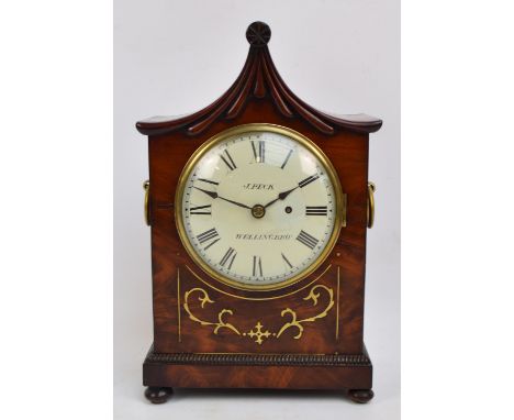 A Regency mahogany and brass inlaid bracket clock, the pagoda top above circular white enamelled dial set with Roman numerals