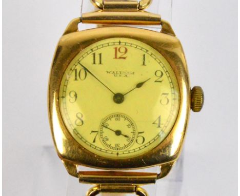 WALTHAM, USA; a 1930s 18ct yellow gold cased manual wind gentleman's wristwatch, the circular dial set with Arabic numerals a