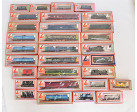 A quantity of Lima model trains including GWR 4589 steam engine, other diesel engines, rolling stock including milk container