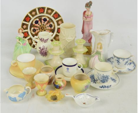 A small group of Royal Worcester porcelain including a simulated bamboo mould decorated vase, height 15cm, a baluster jug, a 