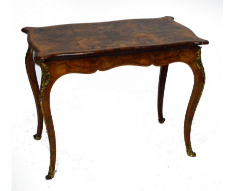 A mid 19th century French burr walnut and amboyna crossbanded serpentine card table, the hinged swivel action top revealing a
