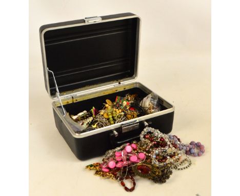 A large collection of costume jewellery including various brooches, pendants and necklaces, also a pair of 9ct gold and simul