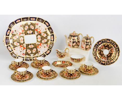 A Royal Crown Derby tea set in 2451 "Traditional Imari" pattern, comprising a teapot, hot water jug, jug and bowl, six cups a