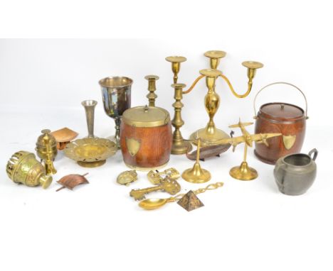 A small quantity of metalware including a kidney shaped brass snuff box, a four branch candelabrum, candlesticks, pewter suga