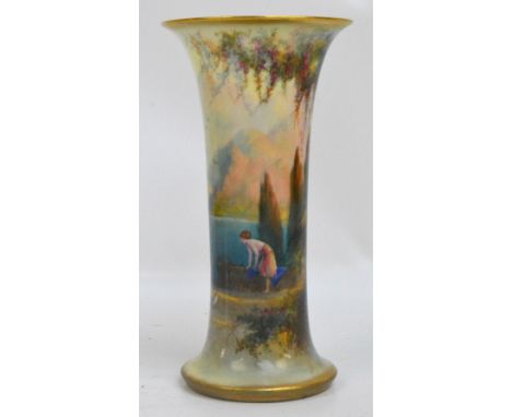 A Royal Worcester porcelain footed flared vase with gilt heightened rim and base, hand painted with mountainous lake landscap