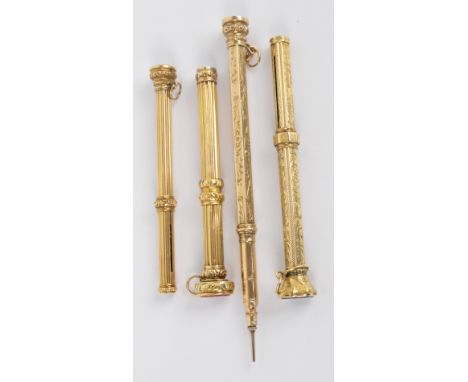 A collection of yellow metal propelling pencils, two with circular reeded shafts, one engraved "S Mordan & Co", the other two