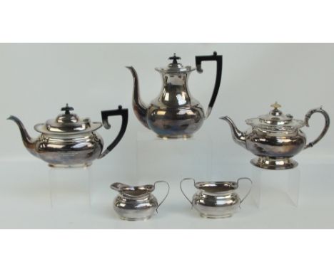 A four piece electroplated tea set with inscription to the teapot "Presented to Miss Ethel Howarth for 25 years service with 