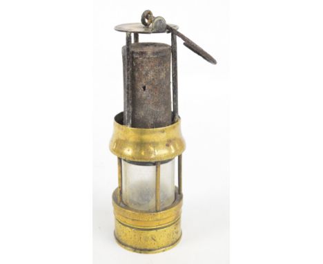 A Richard Johnson Clapham & Morris of Manchester & Liverpool Muesler miner's safety lamp, height 23cm (mesh af).