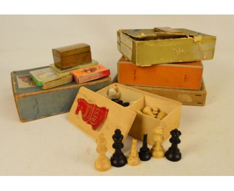 Four boxed sets of vintage wooden jigsaw puzzles including two GWR examples, playing cards, a set of five K&C poker dice in l
