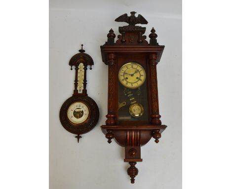 A carved walnut banjo aneroid barometer/thermometer, height 56.5cm, and a spring driven Vienna style wall clock with decorati