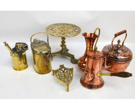 A group of metalware including a copper kettle and hot chocolate pot, a brass stove and an "Optimus" blow lamp.