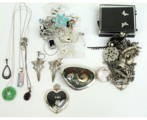 A collection of costume jewellery including 925 standard silver chains, a jadeite circular pendant, a small silver heart shap