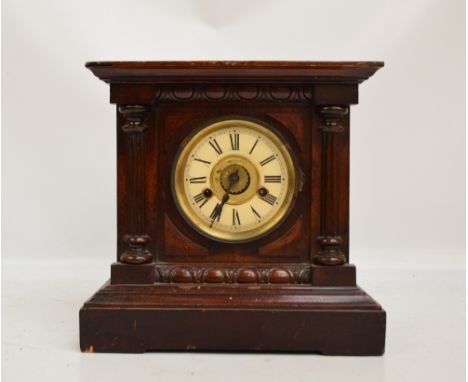 A c.1900 Fattorini "Bugler" alarm clock, the circular dial set with Roman numerals above a stepped base and retaining origina