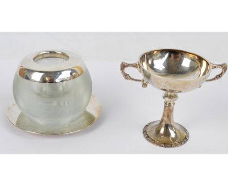 A George V hallmarked silver twin handled trophy with Celtic band decoration, inscribed "Whitefield Golf Glub, The J.S. Rapap