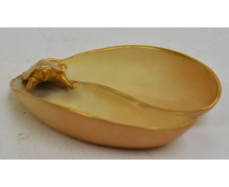 A Royal Worcester pin dish modelled as a turtle upon a lily pad, puce printed marks no.928 to reverse, length 10.75cm.