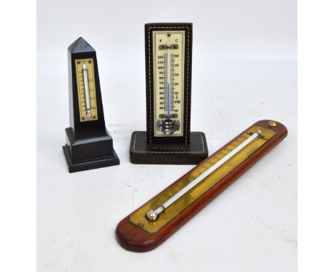 An early 20th century A. Casartelli of Liverpool wall mounted thermometer with brass scales, height 30.5cm, a further ebony e