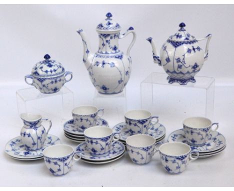 A Royal Copenhagen porcelain coffee set with finely fluted bodies and blue floral decoration comprising a coffee pot, a teapo