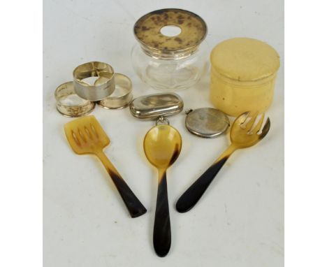 A mixed lot comprising a pair of George V hallmarked silver circular napkin rings, Charles Horner, Chester 1923, a further en