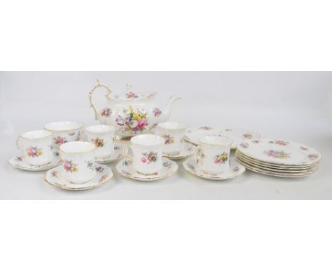 A Hammersley floral pattern part tea service comprising teapot, teapot stand, bowl, sandwich plate, six large tea plates, six