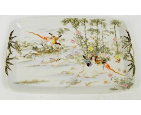 A Chinese Republic period porcelain twin handled tray painted in enamels with three phoenix beside bamboo trees with architec