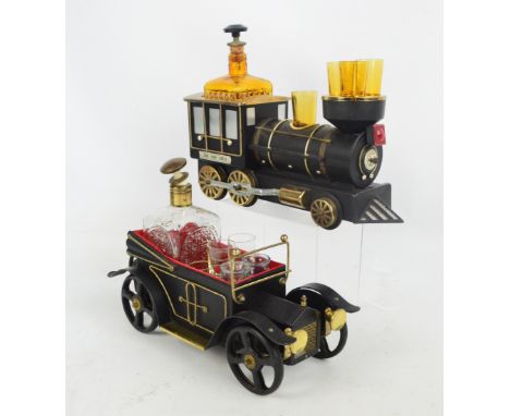 Two novelty musical drinks caddies, each with a decanter and shot glasses, one modelled as a vintage car, the other as a stea