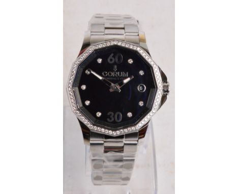 CORUM; an unworn Admiral's Cup Legend 38 diamond set wristwatch, the shaped black dial set with diamonds to the hour points w