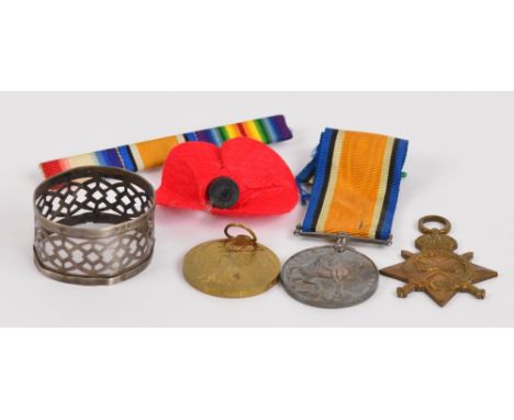 A WWI medal trio; the 1914-15 Star, the British War Medal, and the Victory Medal, all inscribed "18461 PTE. H.C. HOUGHTON. MA
