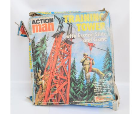 A boxed Action Man training tower including the tower, the upper crane, rope ladder, climbing net, pulley, etc, plus a bearde