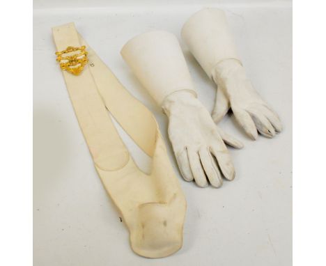 A modern white suede military guard sash with gilt metal buckle and a pair of gauntlets (3).