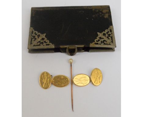 A pair of 18ct oval cufflinks, initialed "WI" to each side (af), a yellow metal and pearl stick pin, and a leather covered an