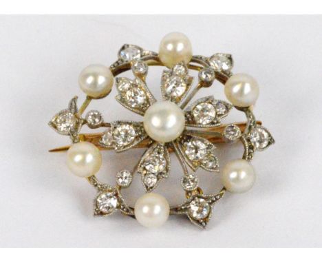 A Victorian diamond and cultured pearl circular floral brooch, the outer and inner leaf motifs set with diamonds with smaller