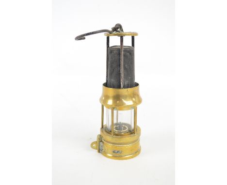 A Richard Johnson Clapham & Morris of Manchester Muesler miner's safety lamp, stamped "200", height 23cm.