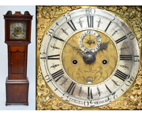 EDWARD BARLOW, OLDHAM (act. c.1725-30); an early 18th century oak longcase clock, the volute above brass cherubic decorated f