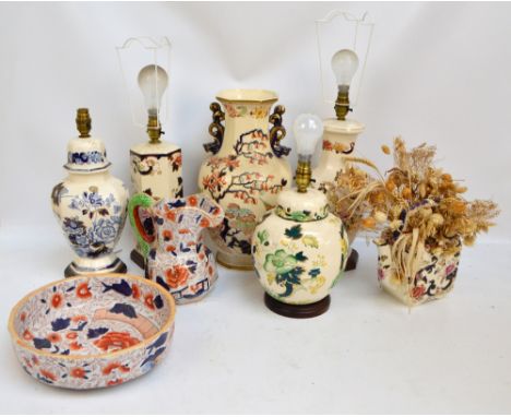 A group of four Masons Ironstone lamp bases decorated with various floral patterns, a large baluster vase and a teapot, also 