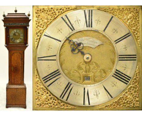 An 18th century oak and crossbanded longcase clock, the moulded caddy top above 11" square dial set with silvered chapter rin