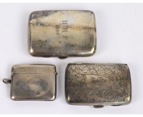 A Victorian hallmarked silver small cigarette case of rounded rectangular curved form with bright cut decoration and monogram