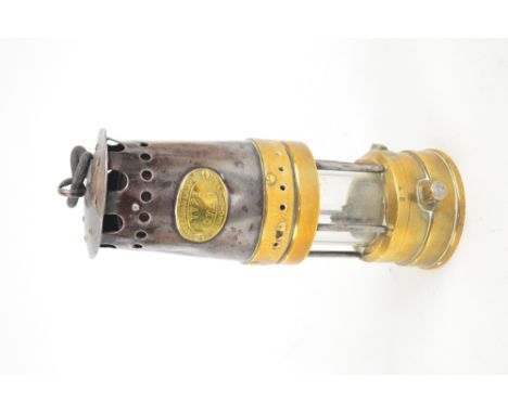 A Patterson Lamps Ltd type GTL 9 miner's Marsaut safety lamp, stamped "27" to the bas, height 25.5cm.