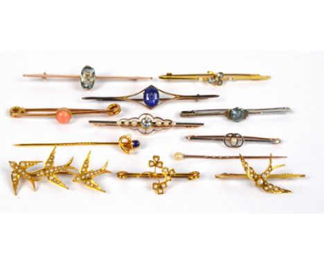 A collection of predominantly 19th century bar brooches including a 15ct yellow gold example set with a seed pearl, a further