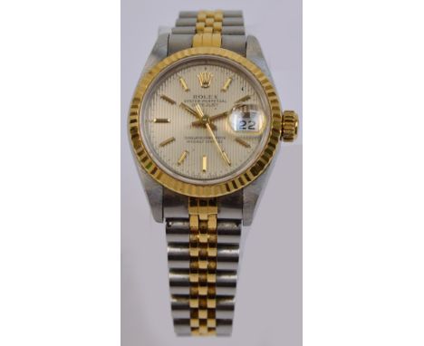 ROLEX; a boxed lady's Oyster Perpetual Datejust, the circular textured dial set with baton numerals and sweeping seconds hand