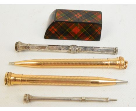 A pair of gold plated "Eversharp" American propelling pencils with engine turned decoration, one with suspension ring, a whit