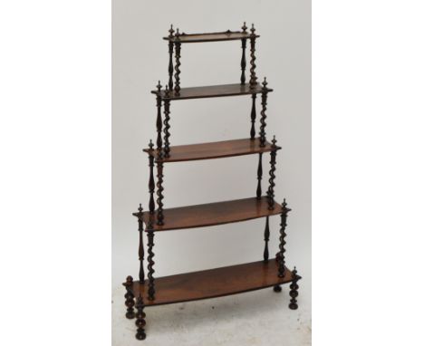 A Victorian rosewood 5 tiered graduated bow fronted whatnot, width 74cm