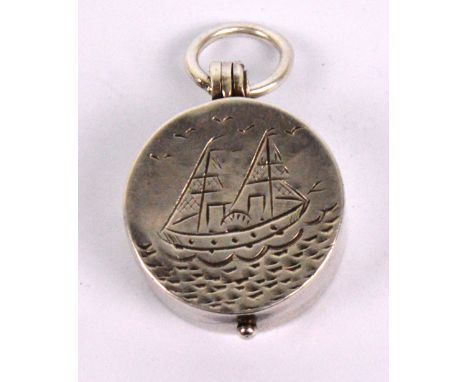 A Victorian hallmarked silver cased small fob compass engraved with a masted ship to the hinged lid and with photo aperture t