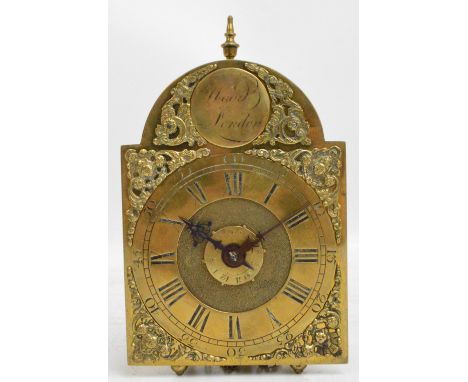 A late 17th century brass lantern clock of small proportions, the arched plate inscribed "Wood, London" above Roman numerals 