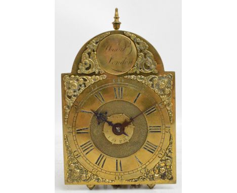 A late 17th century brass lantern clock of small proportions, the arched plate inscribed "Wood, London" above Roman numerals 